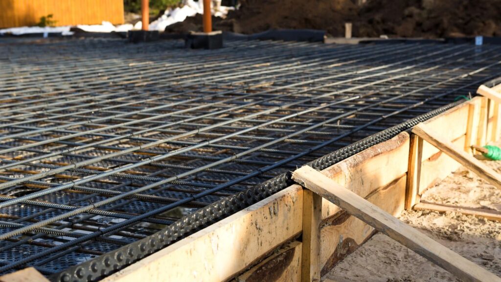 Rebar grid and wood forms set for a concrete slab pour